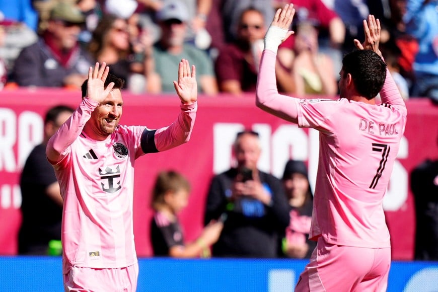 Apr 18, 2026; Denver, Colorado, USA; Inter Miami CF forward Lionel Messi (10) celebrates his game winning goal midfielder Rodrigo de Paul (7) in the second half against the Inter Miami CF at Empower Field at Mile High. Mandatory Credit: Ron Chenoy-Imagn Images     TPX IMAGES OF THE DAY