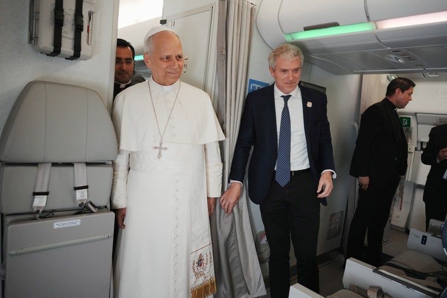 Pope Leo XIV meets with journalists aboard the papal flight from Malabo to Rome, April 23, 2026, at the end of his 11-day pastoral visit to Africa.     Andrew Medichini/Pool via REUTERS