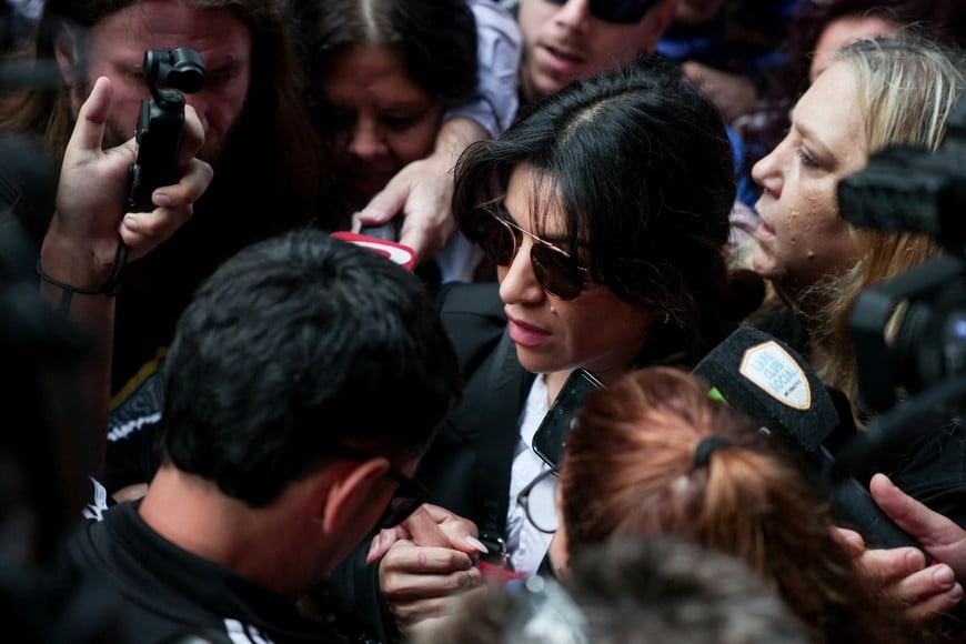 Gianinna Maradona, daughter of late Argentine soccer legend Diego Armando Maradona, arrives at court to attend a new trial against medical professionals facing accusations of negligence in connection to the 2020 death of the global icon, in Buenos Aires, Argentina, April 14, 2026. REUTERS/Cristina Sille