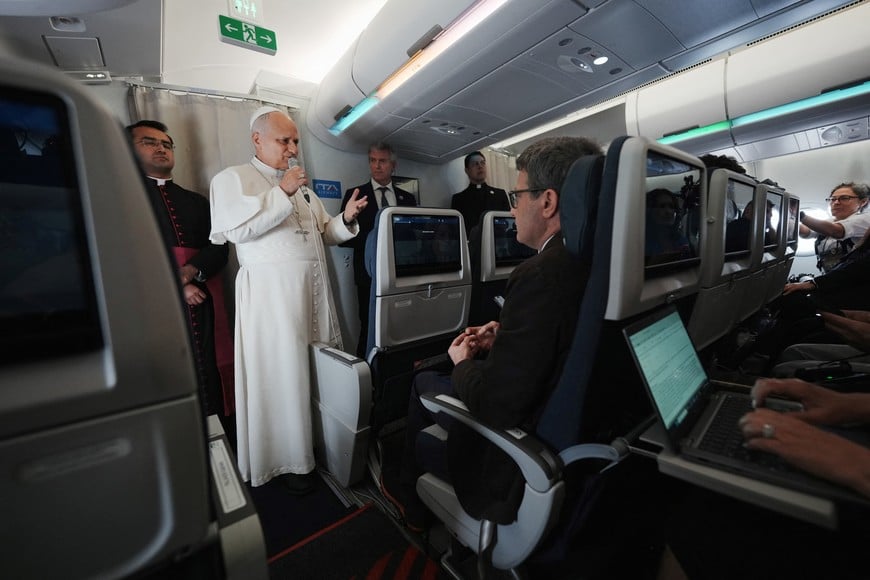 Pope Leo XIV speaks to journalists aboard the papal flight from Malabo to Rome, April 23, 2026, at the end of his 11-day pastoral visit to Africa.     Andrew Medichini/Pool via REUTERS