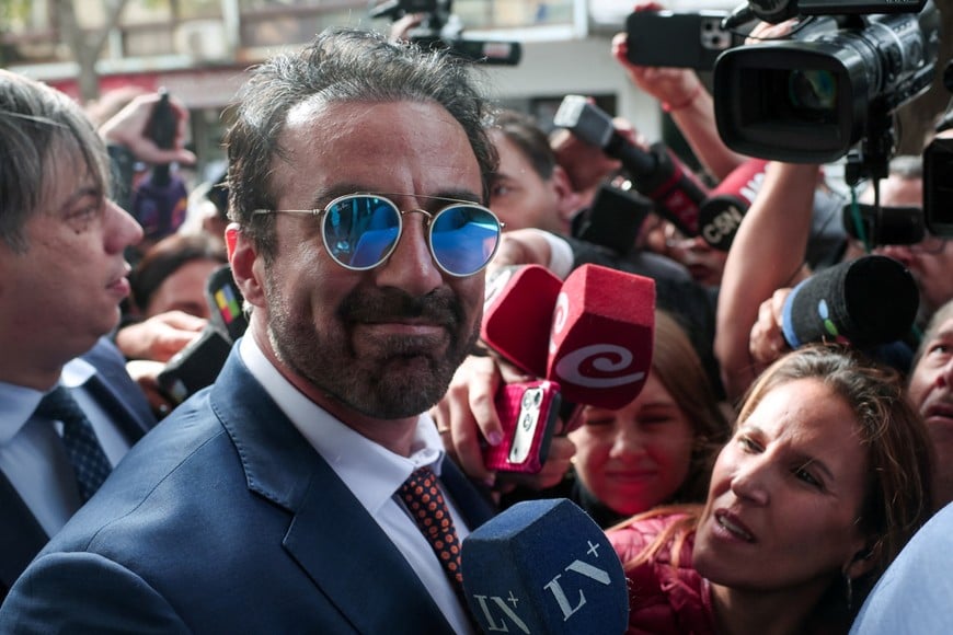 Leopoldo Luque, the personal doctor of late Argentine soccer legend Diego Armando Maradona, arrives at court to attend a new trial against medical professionals facing accusations of negligence in connection to the 2020 death of the global icon, in Buenos Aires, Argentina, April 14, 2026. REUTERS/Cristina Sille