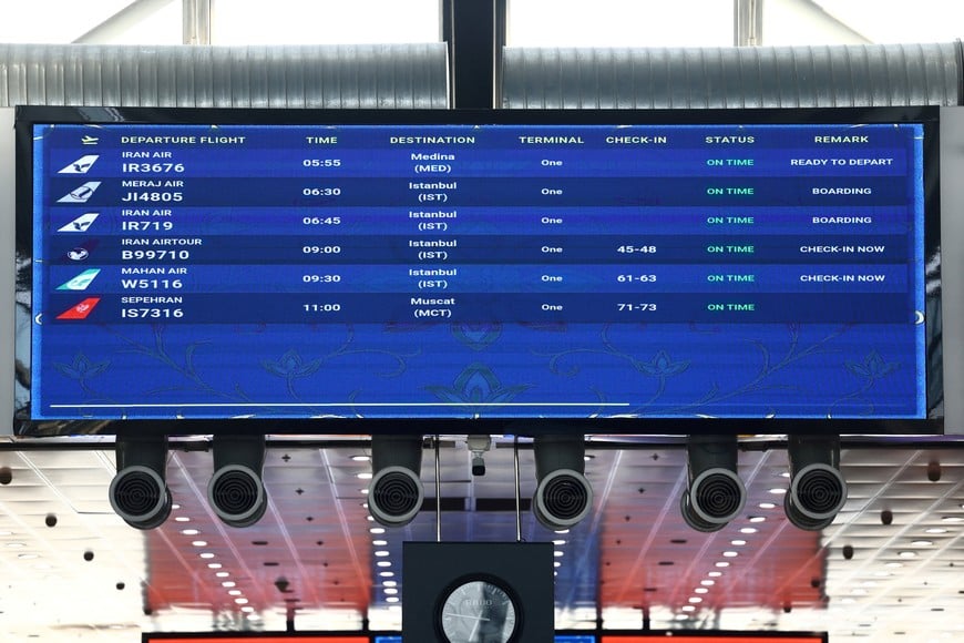A flight board displays flight information after flights resumed at Imam Khomeini International Airport, amid a ceasefire between U.S. and Iran, in Tehran, Iran, April 25, 2026. Majid Asgaripour/WANA (West Asia News Agency) via REUTERS ATTENTION EDITORS - THIS PICTURE WAS PROVIDED BY A THIRD PARTY