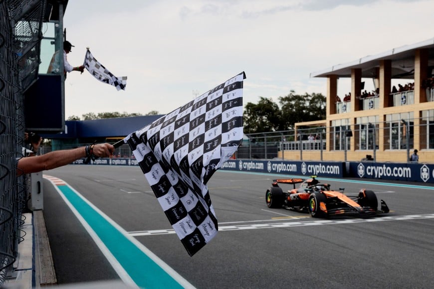 Formula One F1 - Miami Grand Prix - Miami International Autodrome, Miami, Florida, United States - May 4, 2025
McLaren's Lando Norris passes the chequered flag to win second place in the Miami Grand Prix Pool via REUTERS/Shawn Thew