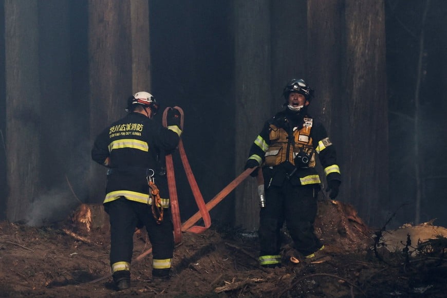 Firefighters work as wildfires continue in Otsuchi, Iwate Prefecture, Japan, April 25, 2026. REUTERS/Kim Kyung-Hoon