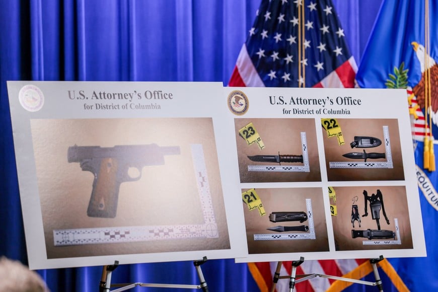 Pictures of the weapons carried by Cole Tomas Allen, the suspect in the shooting incident in Washington at the annual White House Correspondents' Association dinner, are displayed during a press conference at the U.S. Department of Justice about the shooting incident, in Washington, D.C., U.S., April 27, 2026. REUTERS/Kylie Cooper