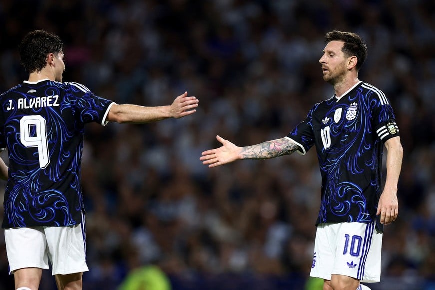 Soccer Football - International Friendly - Argentina v Zambia - Estadio La Bombonera, Buenos Aires, Argentina - March 31, 2026
Argentina's Lionel Messi with Julian Alvarez during the match REUTERS/Agustin Marcarian