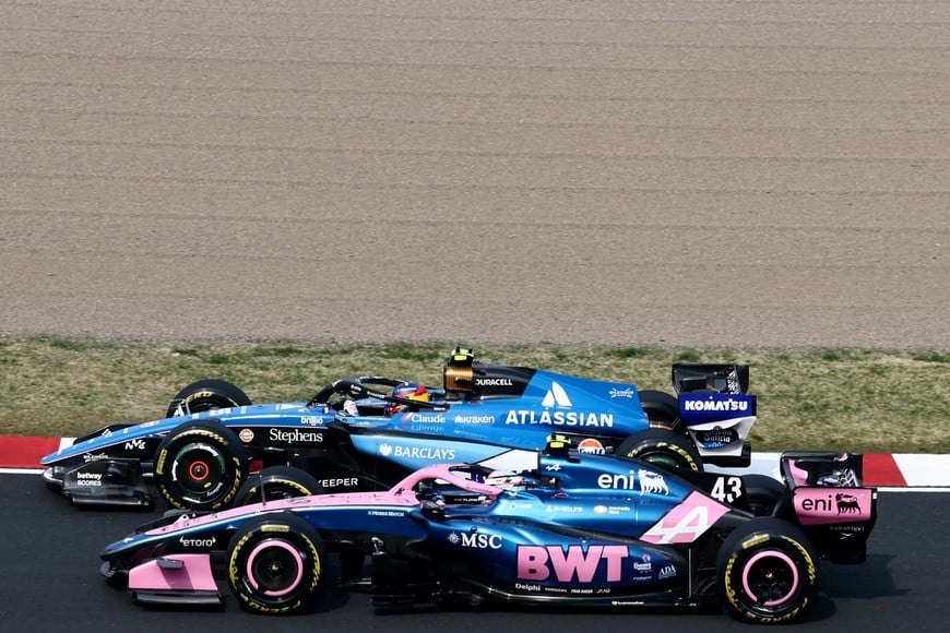 Formula One F1 - Japanese Grand Prix - Suzuka Circuit, Suzuka, Japan - March 29, 2026
Williams' Carlos Sainz Jr. and Alpine's Franco Colapinto during the race REUTERS/Jakub Porzycki