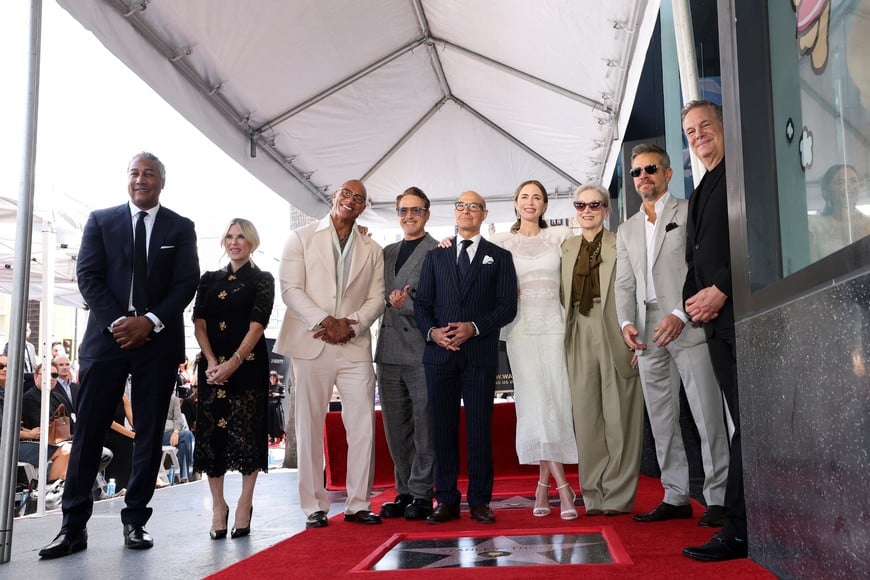 Actors Emily Blunt and Stanley Tucci unveil their stars on the Hollywood Walk of Fame, next to Jerry Neuman, Executive Committee Member, Hollywood Chamber of Commerce, Meryl Streep, Robert Downey Jr., Dwayne Johnson and Matt Damon in Los Angeles, California, U.S., April 30, 2026. REUTERS/Mario Anzuoni