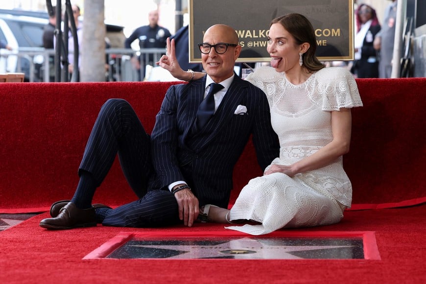 Actors Emily Blunt and Stanley Tucci pose next to their stars on the Hollywood Walk of Fame in Los Angeles, California, U.S., April 30, 2026. REUTERS/Mario Anzuoni