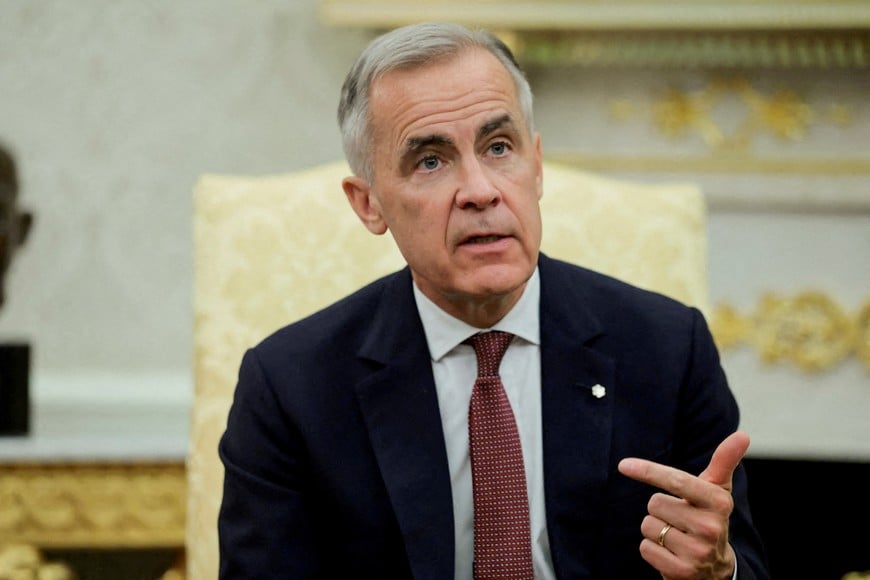 FILE PHOTO: Canadian Prime Minister Mark Carney speaks as he and U.S. President Donald Trump (not pictured) meet in the Oval Office at the White House in Washington, D.C., U.S., October 7, 2025. REUTERS/Evelyn Hockstein/File Photo