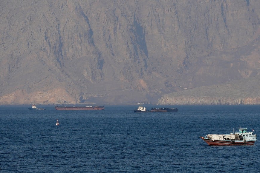 FILE PHOTO: Ships and tankers in the Strait of Hormuz off the coast of Musandam, Oman, April 18, 2026. REUTERS/Stringer REFILE - QUALITY REPEAT/File Photo