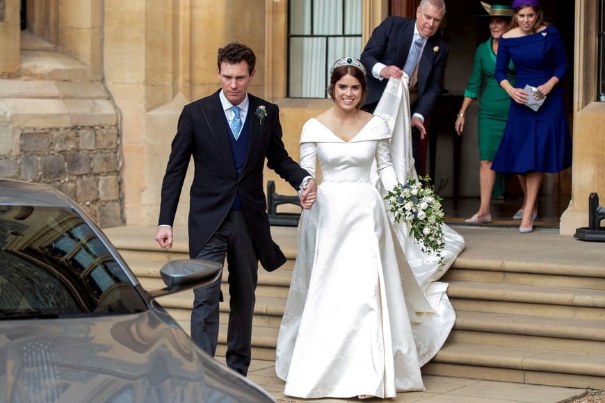 FILE PHOTO: Princess Eugenie and Jack Brooksbank leave Windsor Castle after their wedding for an evening reception at Royal Lodge, in Windsor, Britain October 12, 2018. Steve Parsons/Pool via REUTERS/File Photo