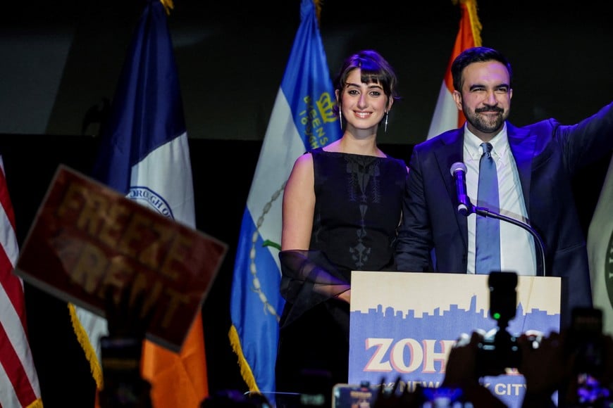 Democratic candidate for New York City mayor Zohran Mamdani celebrates with his wife Rama Duwaji after winning the 2025 New York City Mayoral race, at an election night rally in the Brooklyn borough of New York City, New York, U.S., November 4, 2025. REUTERS/Jeenah Moon
