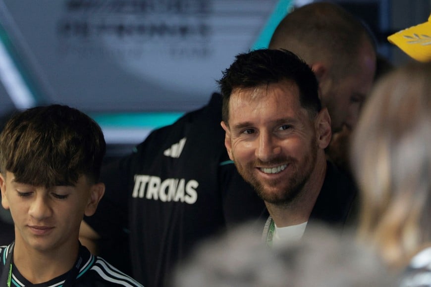Formula One F1 - Miami Grand Prix - Miami International Autodrome, Miami, Florida, United States - May 3, 2026
Footballer Lionel Messi with his son Thiago in the garage of Mercedes' Kimi Antonelli ahead of the grand prix REUTERS/Brian Snyder