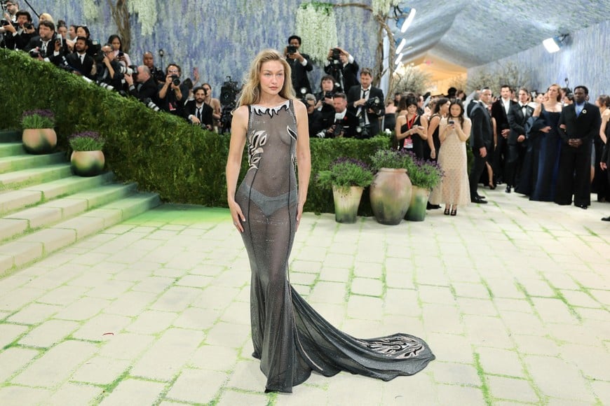 Gigi Hadid poses during the Met Gala, an annual fundraising gala held for the benefit of the Metropolitan Museum of Art's Costume Institute with this year's theme 'Costume Art' in New York City, New York, U.S., May 4, 2026. REUTERS/Daniel Cole     TPX IMAGES OF THE DAY