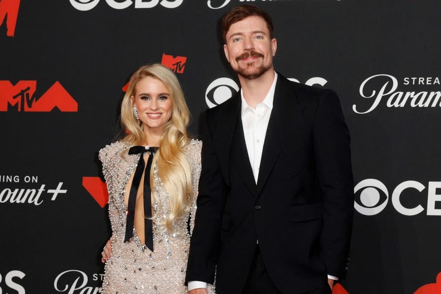 MrBeast and Thea Booysen pose on the red carpet at the 2025 MTV Video Music Awards in Elmont, New York, U.S., September 7, 2025. REUTERS/Kylie Cooper