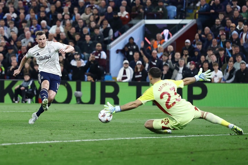 Soccer Football - UEFA Europa League - Semi Final - Second Leg - Aston Villa v Nottingham Forest - Villa Park, Birmingham, Britain - May 7, 2026 
Aston Villa's Emiliano Martinez in action with Nottingham Forest's Chris Wood Action Images via Reuters/Lee Smith