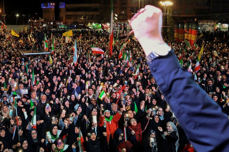 People take part in an anti-U.S. and anti-Israel rally at Enghelab Square amid a ceasefire between U.S. and Iran, in Tehran, Iran, April 15, 2026. REUTERS/Thaier Al-Sudani Foreign media in Iran operate under guidelines set by the Ministry of Culture and Islamic Guidance, which regulates press activity and permissions REFILE - QUALITY REPEAT TPX IMAGES OF THE DAY