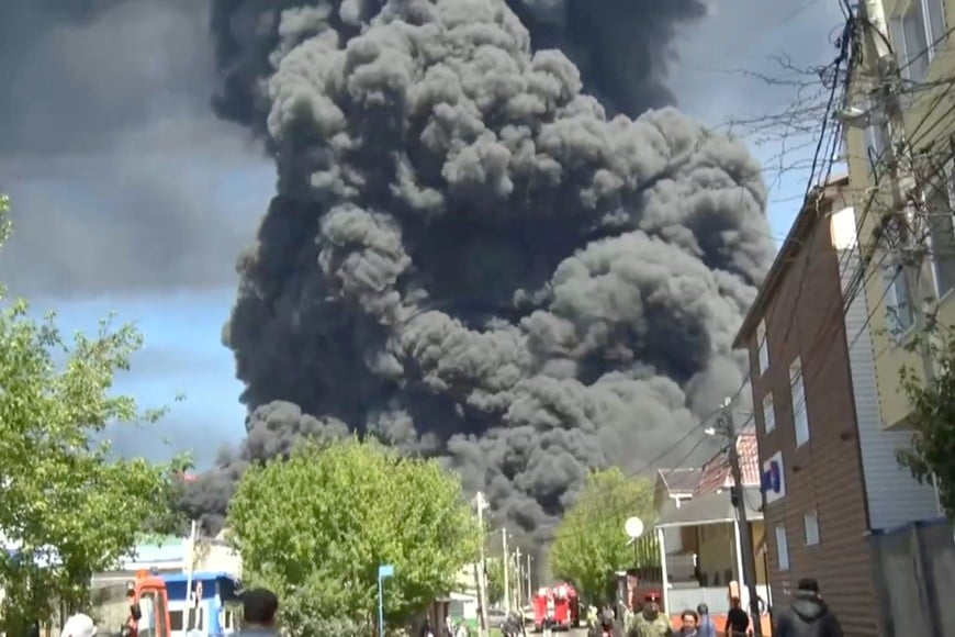 Heavy smoke rises above the area during a visit by Krasnodar region's Governor Veniamin Kondratyev, who inspects emergency services following a Ukrainian drone attack that caused a fire at an oil refinery, amid the Russia-Ukraine conflict, in Tuapse, Russia, April 28, 2026, in this still image taken from video. Governor of Krasnodar Region Veniamin Kondratyev/Handout via REUTERS ATTENTION EDITORS - THIS IMAGE WAS PROVIDED BY A THIRD PARTY. NO RESALES. NO ARCHIVES. MANDATORY CREDIT.