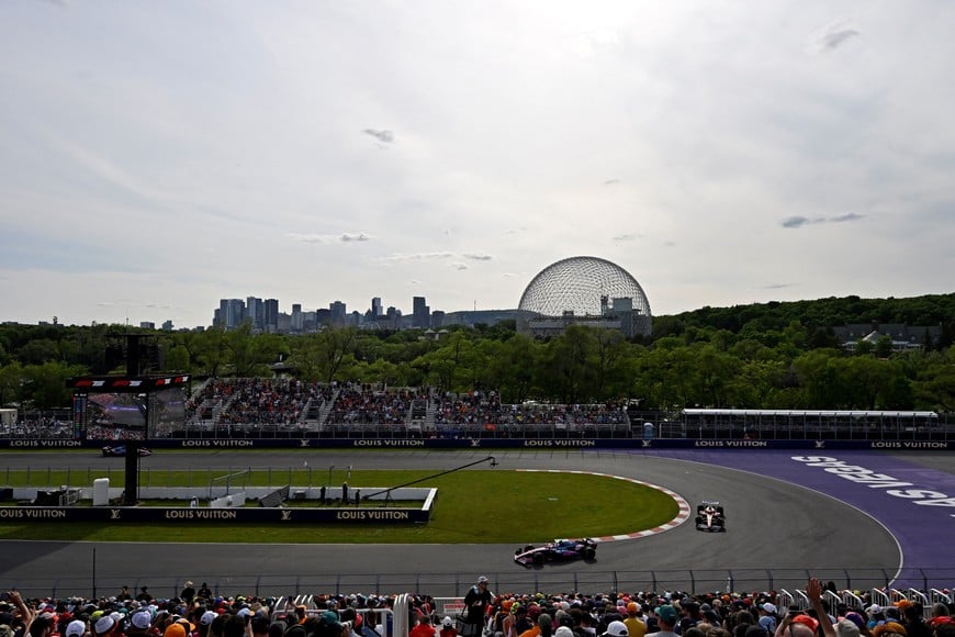 Formula One F1 - Canadian Grand Prix - Circuit Gilles Villeneuve, Montreal, Quebec, Canada - June 13, 2025 
Alpine's Franco Colapinto and Ferrari's Lewis Hamilton during practice REUTERS/Jennifer Gauthier