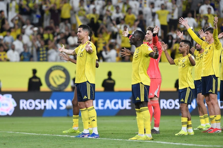 Soccer Football - Saudi Pro League - Al Nassr v Al Najmah - Al Awwal Park, Riyadh, Saudi Arabia - April 3, 2026
Al Nassr's Cristiano Ronaldo, Sadio Mane, Mohamed Simakan, Bento, and teammates celebrate after the match REUTERS/Stringer