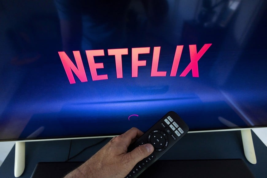 A Netflix logo is shown on a TV screen ahead of a Swiss vote on a referendum called "Lex Netflix" in this illustration taken May 9, 2022. Picture taken May 9, 2022. REUTERS/Denis Balibouse/Illustration