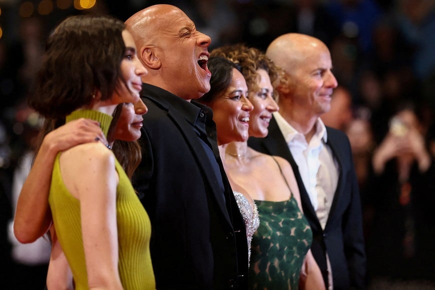 Jordana Brewster, Michelle Rodriguez, Neal H. Moritz, Meadow Walker and Vin Diesel pose on the red carpet for the screening of the film "The Fast and the Furious" presented as part of Special Screenings to celebrate the 25th anniversary of "The Fast and the Furious" franchise at the 79th Cannes Film Festival in Cannes, France, May 14, 2026. REUTERS/Gonzalo Fuentes REFILE - CORRECTING DATE FROM "MAY 13" TO "MAY 14".