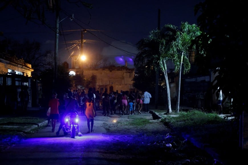People protest against frequent power cuts as the capital Havana faces its worst rolling blackouts in decades amid a U.S. blockade that has strangled the island of fuel, in Havana, Cuba, May 13, 2026. REUTERS/Norlys Perez