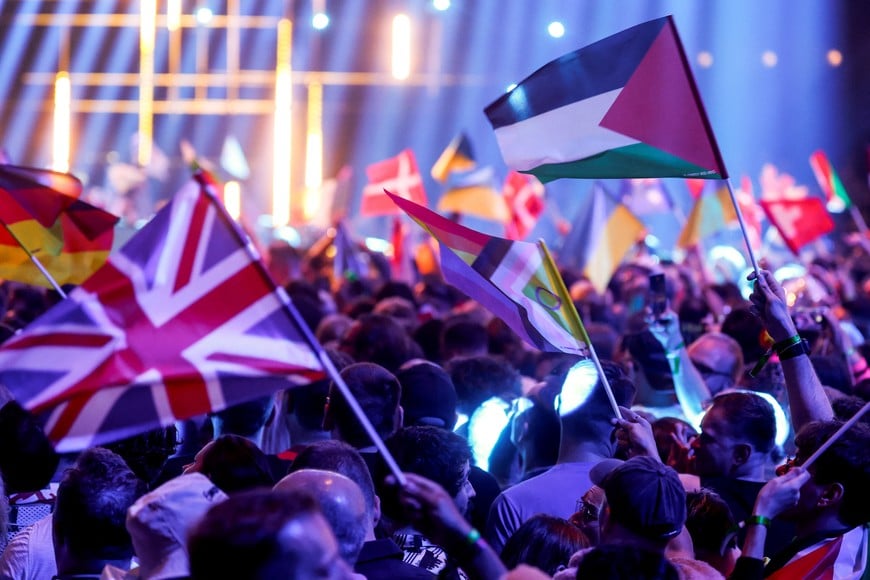 A member of the audience holds a Palestinian flag ahead of the second semi-final of the 2026 Eurovision Song Contest, in Vienna, Austria, May 14, 2026. REUTERS/Lisa Leutner