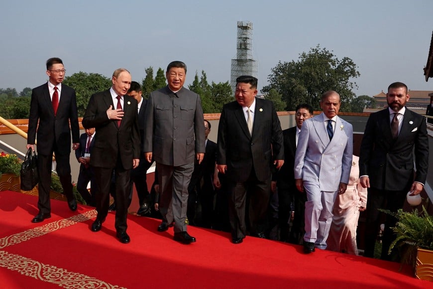 Russian President Vladimir Putin, Chinese President Xi Jinping, North Korean leader Kim Jong Un, Pakistan's Prime Minister Shehbaz Sharif and heads of foreign delegations arrive for a military parade marking the 80th anniversary of the end of World War Two, in Beijing, China September 3, 2025. Sputnik/Alexander Kazakov/Pool via REUTERS ATTENTION EDITORS - THIS IMAGE WAS PROVIDED BY A THIRD PARTY.     TPX IMAGES OF THE DAY