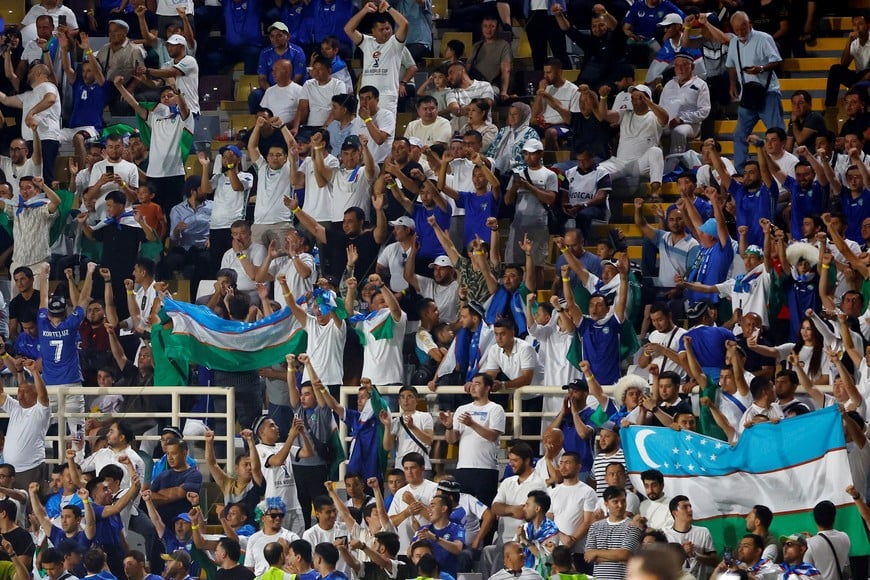Soccer Football - World Cup - AFC Qualifiers - Group A - United Arab Emirates v Uzbekistan - Al Nahyan Stadium, Abu Dhabi, United Arab Emirates - June 5, 2025 
Uzbekistan fans in the stands REUTERS/Rula Rouhana