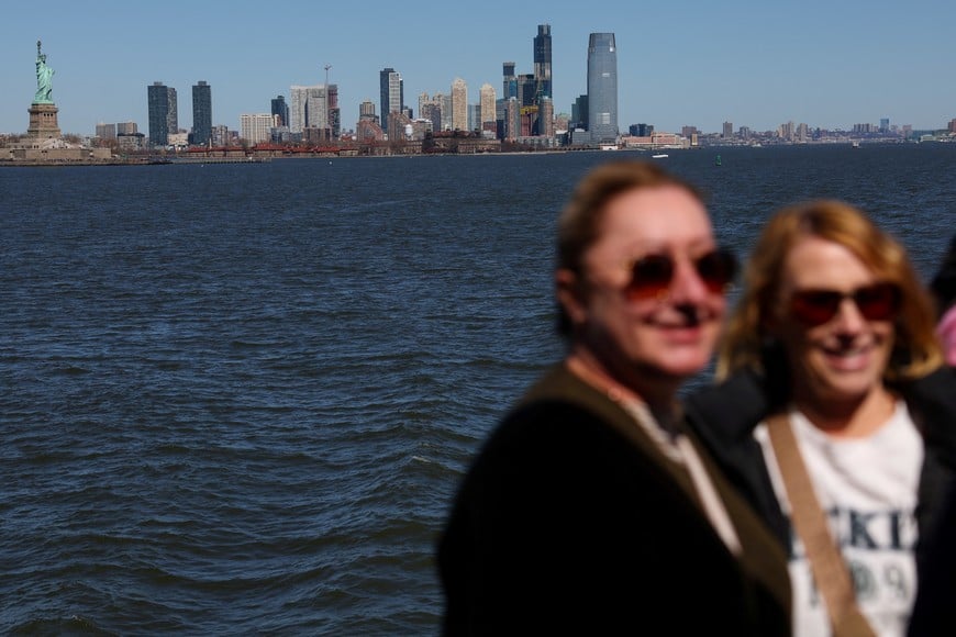 The Statue of Liberty is seen from aboard the Staten Island Ferry in New York City, U.S., March 18, 2025. REUTERS/Shannon Stapleton
