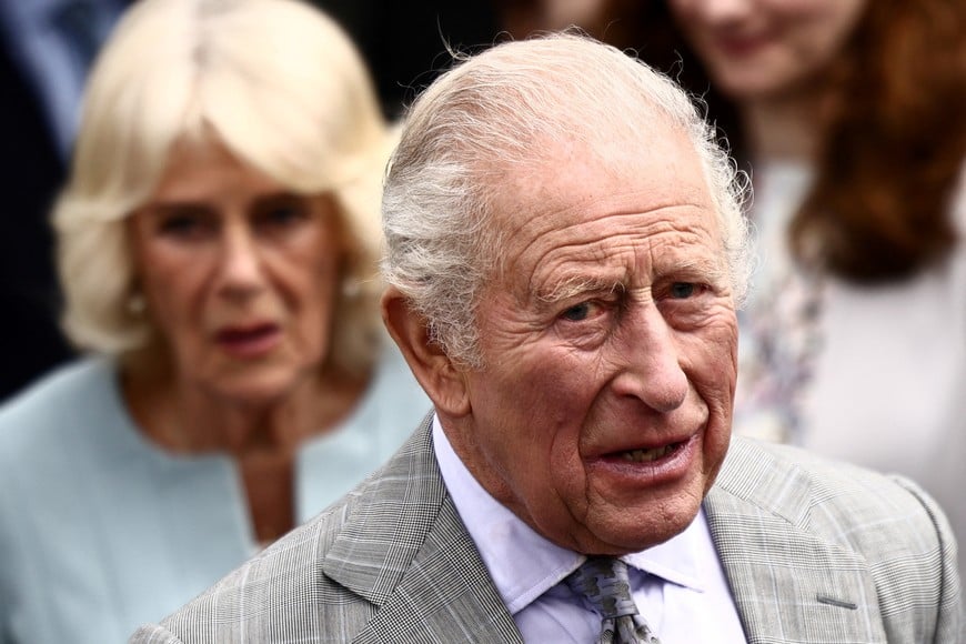 Britain's King Charles III and Queen Camilla leave after a visit to The Warehouse,which has been transformed into a lively and welcoming community hub, offering vital support through free food supplies, hot and take-home meals, skills classes, and access to free clothing and household essentials, in Newtownards, Northern Ireland on May 21, 2026. HENRY NICHOLLS/Pool via REUTERS??