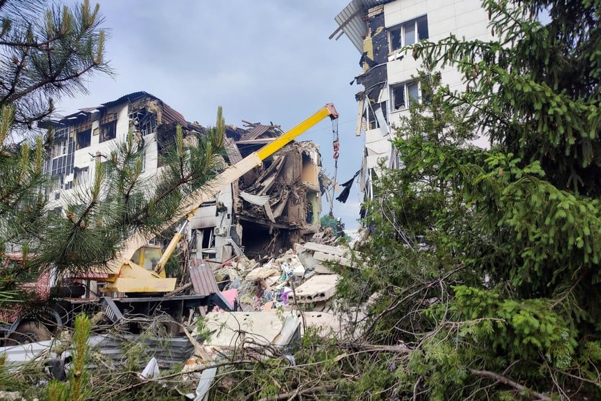 Rescuers work amid debris of a destroyed dormitory building of the Starobilsk College of Luhansk Pedagogical University following an overnight attack, what Russian-installed authorities called a Ukrainian drone strike, in the course of the Russia-Ukraine conflict in the town of Starobilsk (Starobelsk) in the Luhansk region, a Russian-controlled area of Ukraine, May 22, 2026. Picture taken with a mobile phone. REUTERS/Pavel Klimov