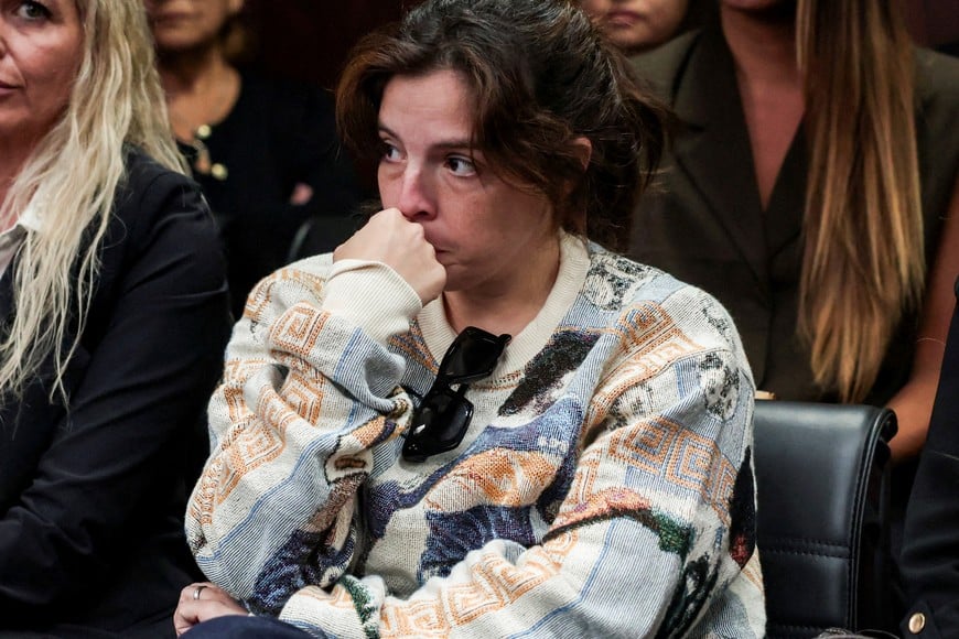 Dalma Maradona, daughter of late Argentine soccer legend Diego Armando Maradona, sits inside a court to attend a new trial against medical professionals facing accusations of negligence in connection to the 2020 death of the global icon, in Buenos Aires, Argentina, April 14, 2026. REUTERS/Cristina Sille REFILE - QUALITY REPEAT TPX IMAGES OF THE DAY