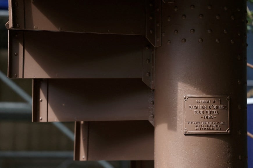 FILE PHOTO: A portion of the original staircase of the Eiffel Tower built by Gustave Eiffel in 1889 is displayed during a press preview ahead of its upcoming auction organized by Artcurial in Paris, France, May 13, 2026. REUTERS/Alice Sacco/File Photo