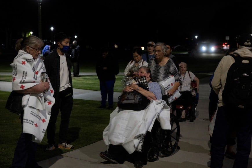 Residents register at a temporary shelter in Fountain Valley, California, following their evacuation prompted by a failing chemical tank containing methyl methacrylate, a flammable liquid used in the aerospace industry, in nearby Garden Grove, California, May 22, 2026. REUTERS/Ed Ou