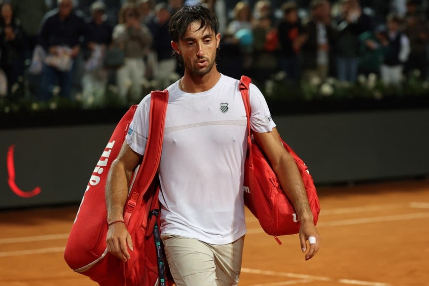 Tennis - Italian Open - Foro Italico, Rome, Italy - May 12, 2026
Argentina's Thiago Tirante looks dejected after his round of 16 match against Russia's Daniil Medvedev REUTERS/Claudia Greco