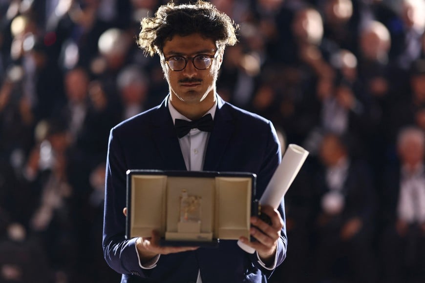Director Federico Luis, Short film Palme d'Or award winner for the short film "Aux adversaires" (Para los contrincantes, For the Opponents), poses during a photocall after the closing ceremony of the 79th Cannes Film Festival in Cannes, France, May 23, 2026. REUTERS/Gonzalo Fuentes