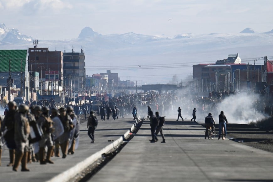 Security forces use tear gas during nationwide protests aiming to press Bolivian President Rodrigo Paz's government to roll back austerity measures and address rising costs of living, in El Alto, Bolivia, May 23, 2026. REUTERS/Claudia Morales