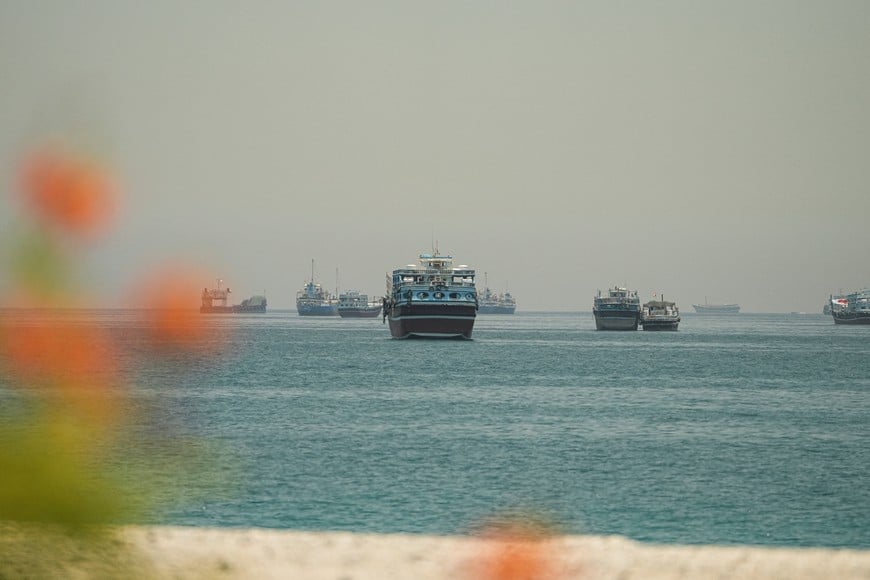 Vessels sail through the Strait of Hormuz, as seen from Musandam, Oman, May 25, 2026. REUTERS/Stringer