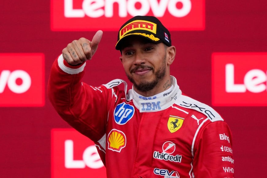 Formula One F1 - Canadian Grand Prix - Circuit Gilles Villeneuve, Montreal, Quebec, Canada - May 24, 2026
Ferrari's Lewis Hamilton celebrates on the podium after finishing second place in the Canadian Grand Prix REUTERS/Mathieu Belanger