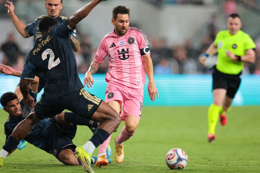 May 24, 2026; Miami, Florida, USA; Inter Miami CF forward Lionel Messi (10) dribbles the ball against Philadelphia Union defender Geiner Martinez (2) during the second half at Nu Stadium. Mandatory Credit: Sam Navarro-Imagn Images