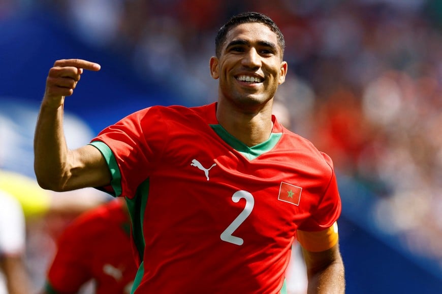 Paris 2024 Olympics - Football - Men's Quarter-final - Morocco vs United States - Parc des Princes, Paris, France - August 02, 2024.
Achraf Hakimi of Morocco celebrates scoring their third goal. REUTERS/Piroschka Van De Wouw