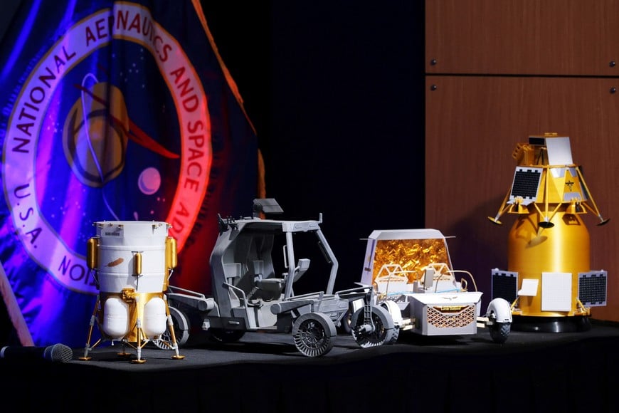 NASA displays newly unveiled lunar base project models from Blue Origin, Lunar Outpost and other companies during a news conference on updated plans for the agency’s Moon Base initiative for a long-term lunar presence, at NASA headquarters in Washington, D.C., U.S., May 26, 2026. REUTERS/Jonathan Ernst