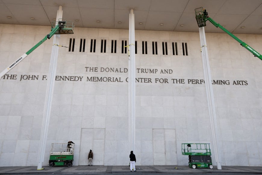 FILE PHOTO: The newly added lettering for U.S. President Donald Trump's name is displayed at the facade of the John F. Kennedy Center for the Performing Arts, a day after its board announced it would rename the institution The Donald J. Trump and The John F. Kennedy Memorial Center for the Performing Arts, in Washington, D.C., U.S., December 19, 2025. REUTERS/Kevin Lamarque/File Photo