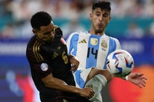 Soccer Football - Copa America 2024 - Group A - Argentina v Peru  - Hard Rock Stadium, Miami, Florida, United States - June 29, 2024
Argentina's Exequiel Palacios in action with Peru's Marcos Lopez REUTERS/Agustin Marcarian