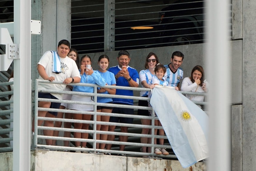 May 31, 2026; Kansas City, Missouri, USA; Argentina fans watch as the men's national team arrives for the 2026 FIFA World Cup at Kansas City International Airport. Mandatory Credit: Denny Medley-Imagn Images