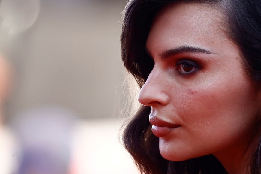 Emily Ratajkowski poses on the red carpet during arrivals for the screening of the movie "Campo di Battaglia" (Battlefield), in competition, at the 81st Venice Film Festival, Venice, Italy, August 31, 2024. REUTERS/Yara Nardi