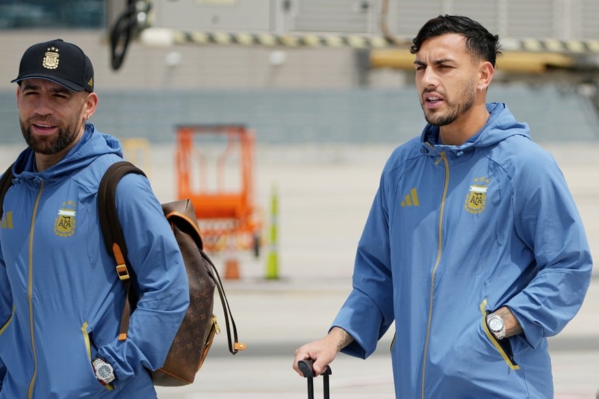 May 31, 2026; Kansas City, Missouri, USA; Nicolas Otamendi (left) and Exequiel Palacios (right) of Argentina arrive for the 2026 FIFA World Cup at Kansas City International Airport. Mandatory Credit: Denny Medley-Imagn Images